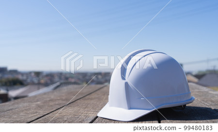 Helmet and cityscape | Construction industry / manufacturing industry image 99480183