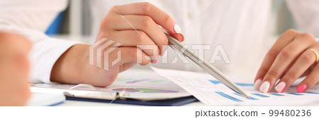 Business colleague discussing paperwork analytics chart closeup Business colleague discussing paperwork analytics chart closeup 99480236