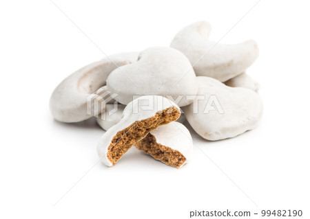 Gingerbread cookies with sugar icing isolated on white backgorund. 99482190