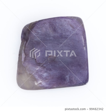 Natural gemstone purple charoite isolated on white background 99482342