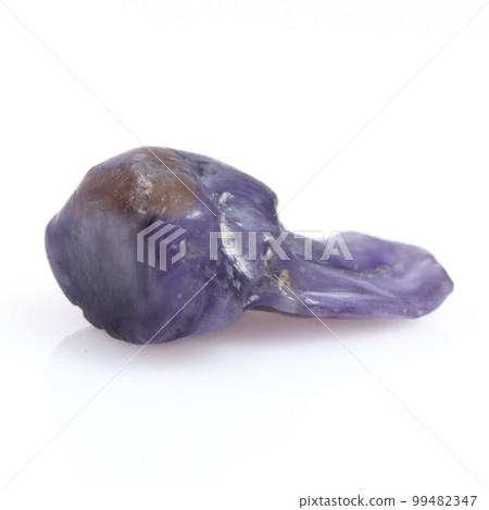 Natural gemstone purple charoite isolated on white background 99482347