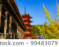 Five-storied pagoda and autumn leaves of Miyajima, a World Heritage Site 99483079