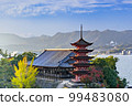 Five-storied pagoda and autumn leaves of Miyajima, a World Heritage Site 99483080