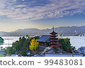 Five-storied pagoda and autumn leaves of Miyajima, a World Heritage Site 99483081