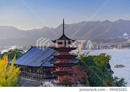 Five-storied pagoda and autumn leaves of Miyajima, a World Heritage Site 99483082