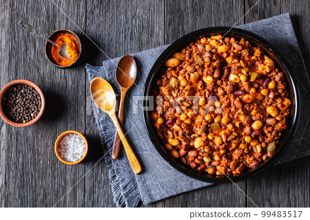 Beans and Sausage bake in baking dish, top view 99483517