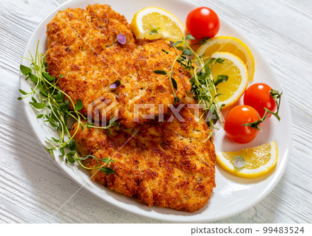 fried chicken cutlets under crusting of panko fried chicken cutlets under crusting of panko 99483524
