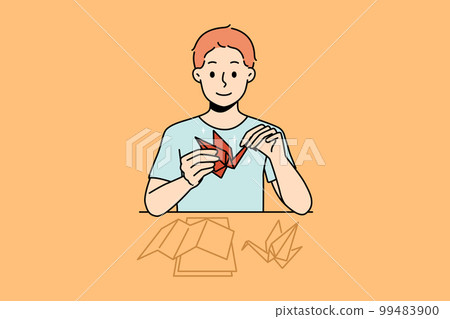 Happy child make origami  99483900