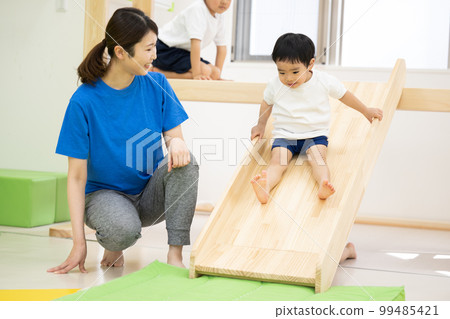 Children exercising at nursery schools and sports clubs Children exercising at nursery schools and sports clubs 99485421