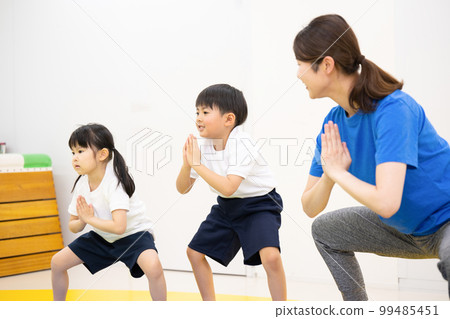 children exercising indoors children exercising indoors 99485451