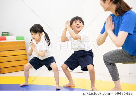 children exercising indoors 99485452