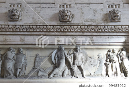Marble fresque on the Milan's main railway station. Urban architectural photography. Marble fresque on the Milan's main railway station. Urban architectural photography. 99485912