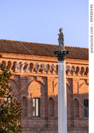 Galleria degli Antichi in Sabbioneta stands the majestic Column with the statue of Minerva Galleria degli Antichi in Sabbioneta stands the majestic Column with the statue of Minerva 99486940