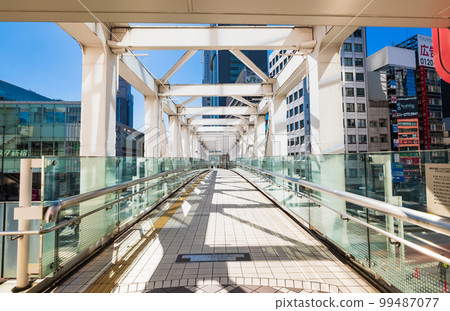 Tokyo, cityscape, pedestrian bridge image: Shinjuku 99487077