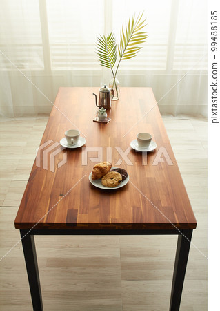 Interior design with wooden table Interior design with wooden table 99488185