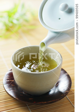 Tea to be poured Tea to be poured 99489505