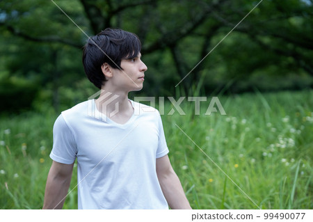 Half man enjoying the fresh green park 99490077