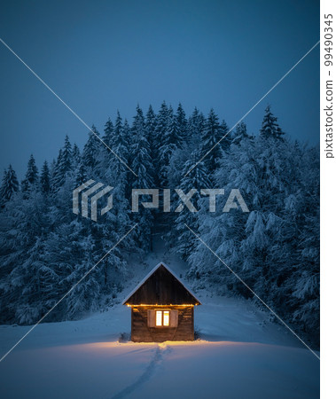 Fantastic landscape with snowy house Fantastic landscape with snowy house 99490345