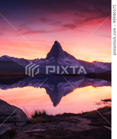 Matterhorn peak on Stellisee lake 99490375