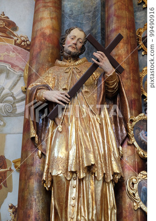 Saint Francis Xavier statue on altar in the Baroque Church of Our Lady of the Snows in Belec, Croatia 99490916
