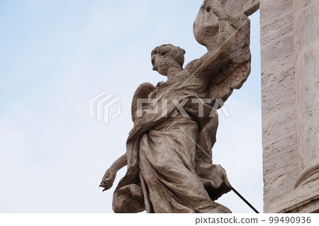 Angel on the portal of Sant Andrea della Valle Church in Rome, Italy 99490936