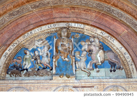 Virgin holding the Christ child, centered between, the Annunciation to the Shepherds and the Adoration of the Magi, Cathedral dedicated to the Virgin Mary in Verona 99490945