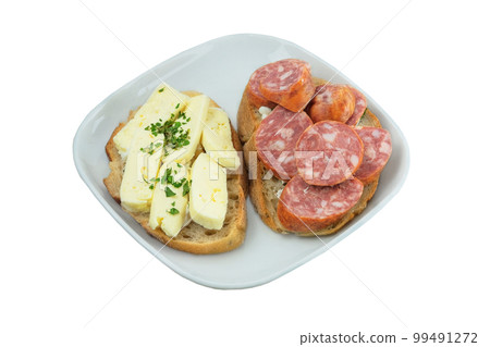 Sandwiches for breakfast. Slices of bread with sausage and soft cheese. Isolate on a white background. Sandwiches for breakfast. Slices of bread with sausage and soft cheese. Isolate on a white background. 99491272