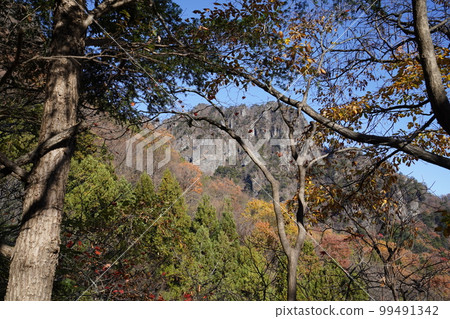 Ura-Myogi's rocky mountain seen from the hiking trail to Sanpokyo November 25, 2022 Ura-Myogi's rocky mountain seen from the hiking trail to Sanpokyo November 25, 2022 99491342