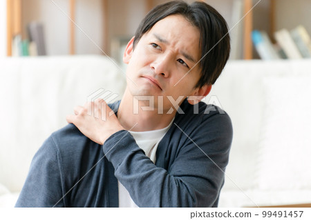 Men rubbing shoulders Men rubbing shoulders 99491457