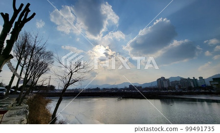 Winter's passing river Winter's passing river 99491735