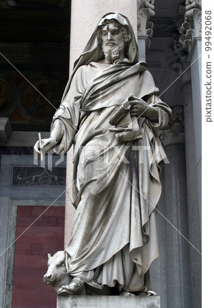 Saint Luke the Evangelist, statue in front of the basilica of Saint Paul Outside the Walls, Rome, Italy Saint Luke the Evangelist, statue in front of the basilica of Saint Paul Outside the Walls, Rome, Italy 99492068