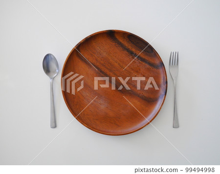 wooden plate and spoon/fork 99494998