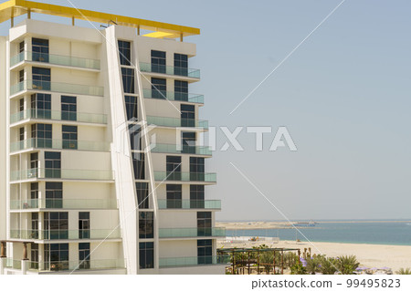 Modern building on sunny day with a blue sky. Modern building on sunny day with a blue sky. 99495823