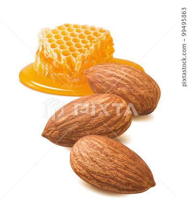 Almonds and honeycomb piece isolated on white background. Nuts and honey. Vertical layout Almonds and honeycomb piece isolated on white background. Nuts and honey. Vertical layout 99495863
