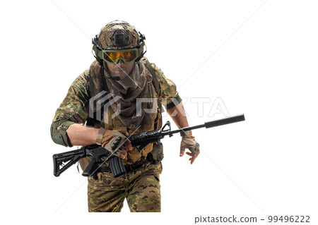 A hired soldier with an automatic rifle running right on the camera. A hired soldier with an automatic rifle running right on the camera. 99496222