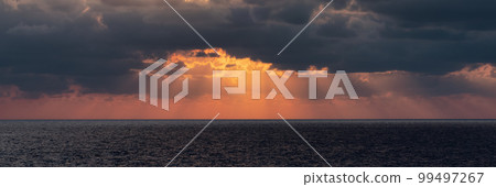 Dramatic Colorful Sunset Sky over Mediterranean Sea. Cloudscape Background 99497267