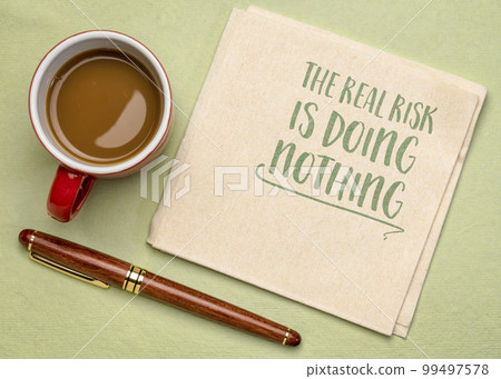 the real risk is doing nothing - inspirational reminder, procrastination and personal development concept 99497578