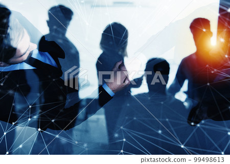 Handshaking business person in office with network effect. concept of teamwork and partnership. double exposure 99498613
