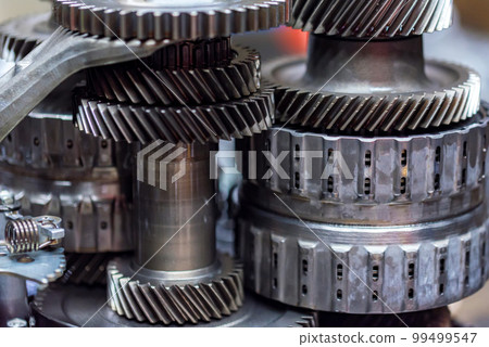 Close-up helical gears in car automatic transmission 99499547