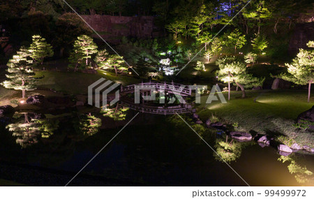 Night view of the Gyokuseninmaru Garden, Kanazawa Castle Park, Japan. 99499972