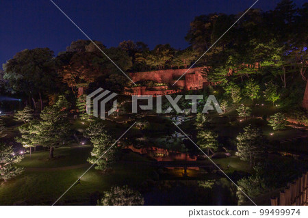 Night view of the Gyokuseninmaru Garden, Kanazawa Castle Park, Japan. 99499974