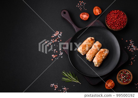 Delicious baked pork or chicken roll with mushrooms, spices and herbs 99500192