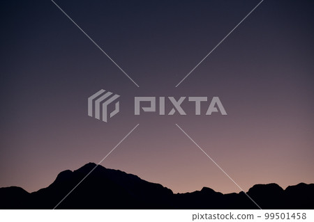Hakushu-cho, Hokuto City, the first star that began to shine in the evening sky, the evening star and the silhouette of the mountains Hakushu-cho, Hokuto City, the first star that began to shine in the evening sky, the evening star and the silhouette of the mountains 99501458