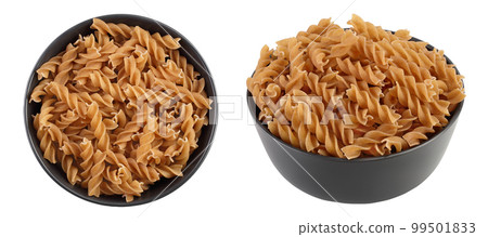 Wolegrain fusilli pasta from durum wheat in ceramic bowl isolated on white background with full depth of field. Top view. Flat lay. Wolegrain fusilli pasta from durum wheat in ceramic bowl isolated on white background with full depth of field. Top view. Flat lay. 99501833