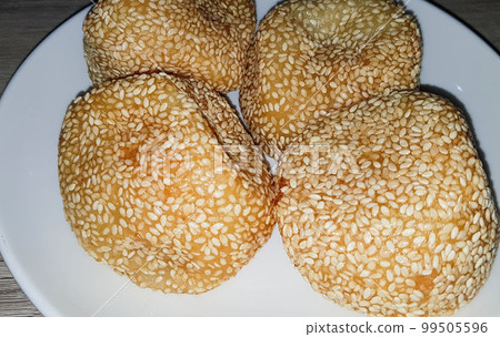 Onde-Onde is traditional food from Indonesia made from glutinous rice flour with beans pasta, wrapped in sesame seeds 99505596