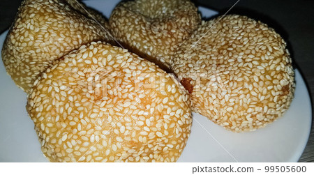 Onde-Onde is traditional food from Indonesia made from glutinous rice flour with beans pasta, wrapped in sesame seeds Onde-Onde is traditional food from Indonesia made from glutinous rice flour with beans pasta, wrapped in sesame seeds 99505600