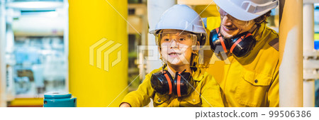 BANNER, LONG FORMAT Young man and a little boy are both in a yellow work uniform, glasses, and helmet in an industrial environment, oil Platform or liquefied gas plant BANNER, LONG FORMAT Young man and a little boy are both in a yellow work uniform, glasses, and helmet in an industrial environment, oil Platform or liquefied gas plant 99506386