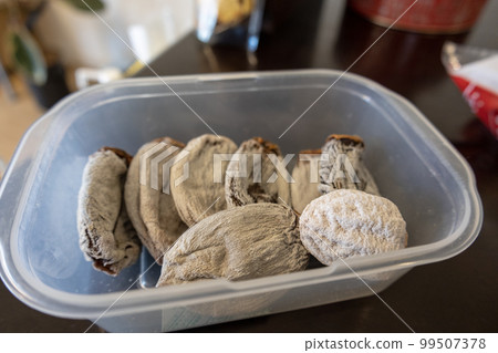 Dried persimmons in Tupperware 99507378