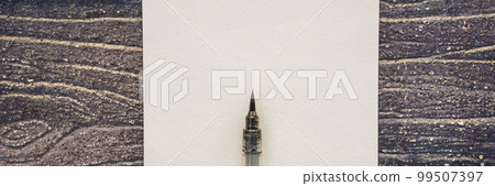 Women's hands in a wooden background holding a signboard, drawing block, paper, mockup BANNER, LONG FORMAT Women's hands in a wooden background holding a signboard, drawing block, paper, mockup BANNER, LONG FORMAT 99507397