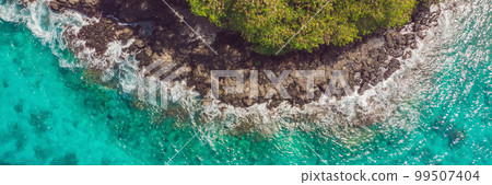 Sea bay with turquoise water and a small white beach. Beautiful lagoon and volcanic island covered with dense forest, view from above BANNER, LONG FORMAT Sea bay with turquoise water and a small white beach. Beautiful lagoon and volcanic island covered with dense forest, view from above BANNER, LONG FORMAT 99507404